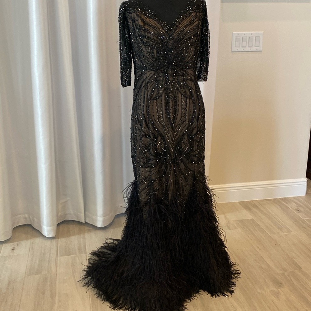Ivonne D collection by Montage black and nude gown